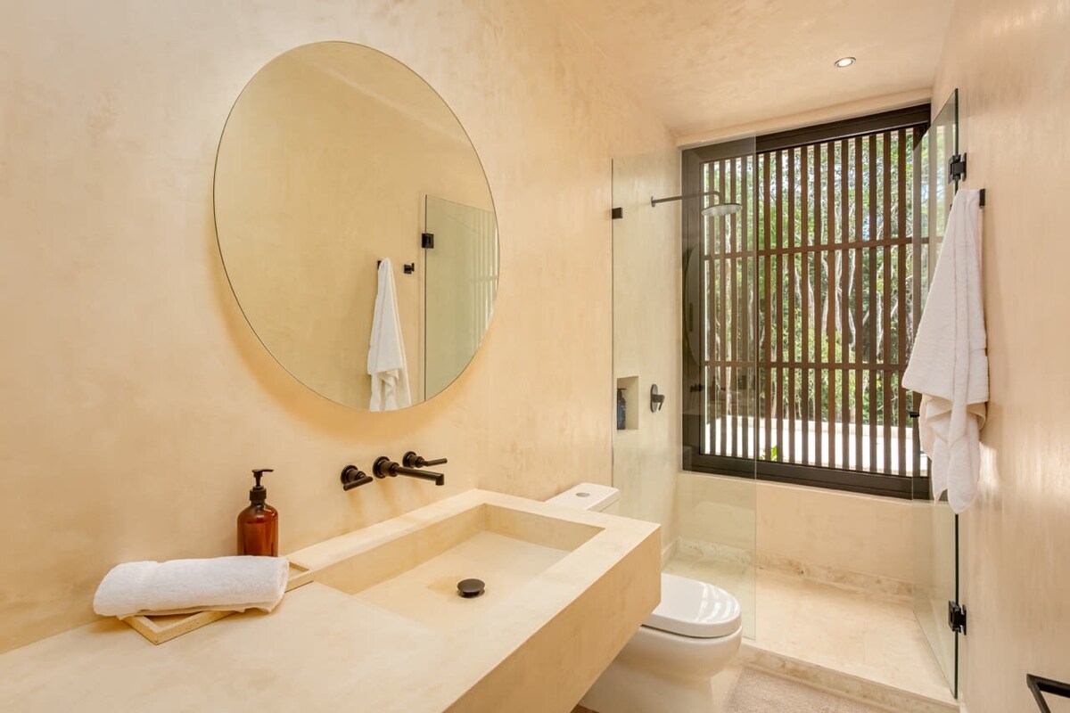 Private pool with evening lighting and tropical plants
