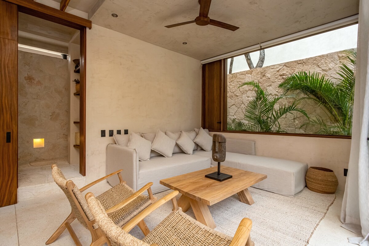 Private terrace with hammock and jungle backdrop