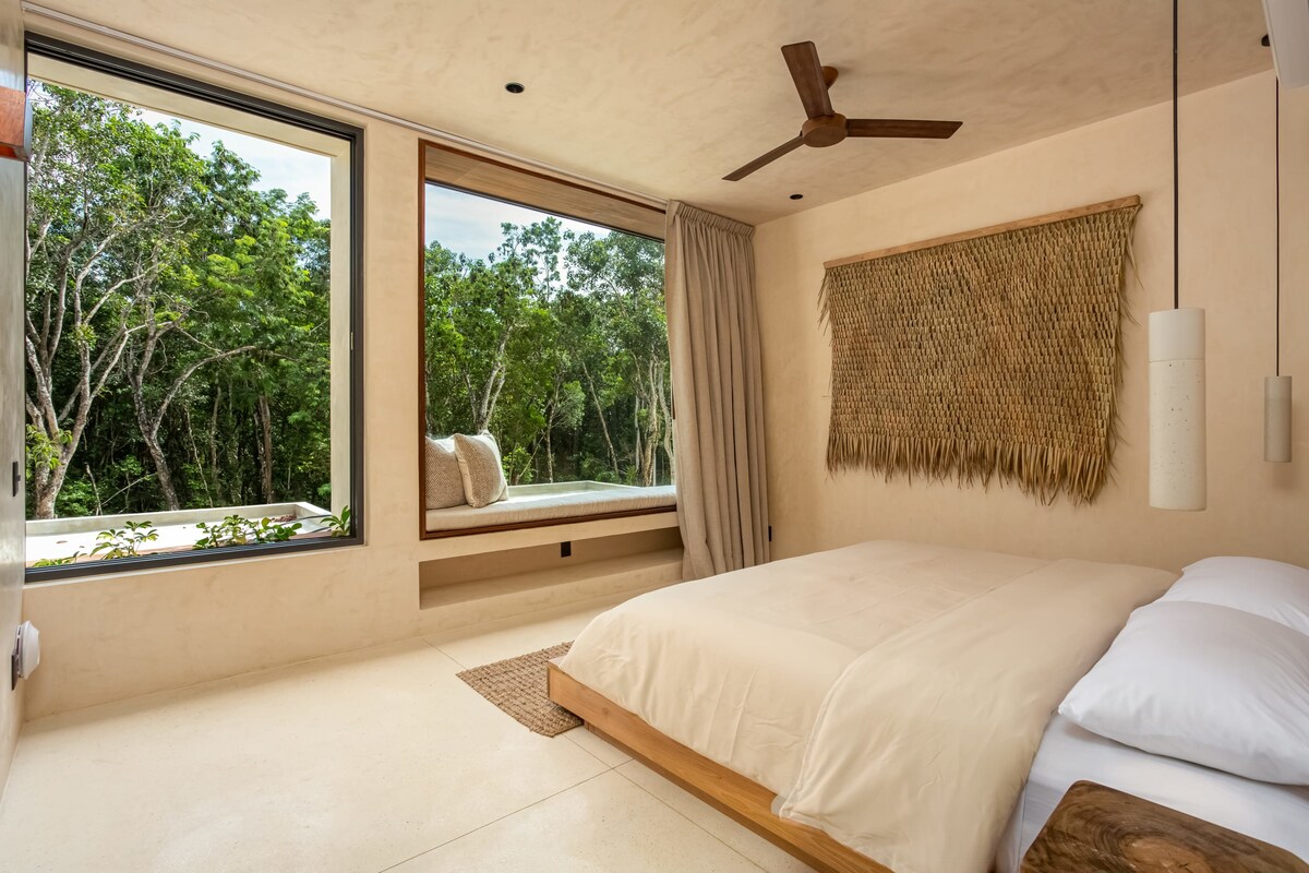 Night view of illuminated pool and terrace