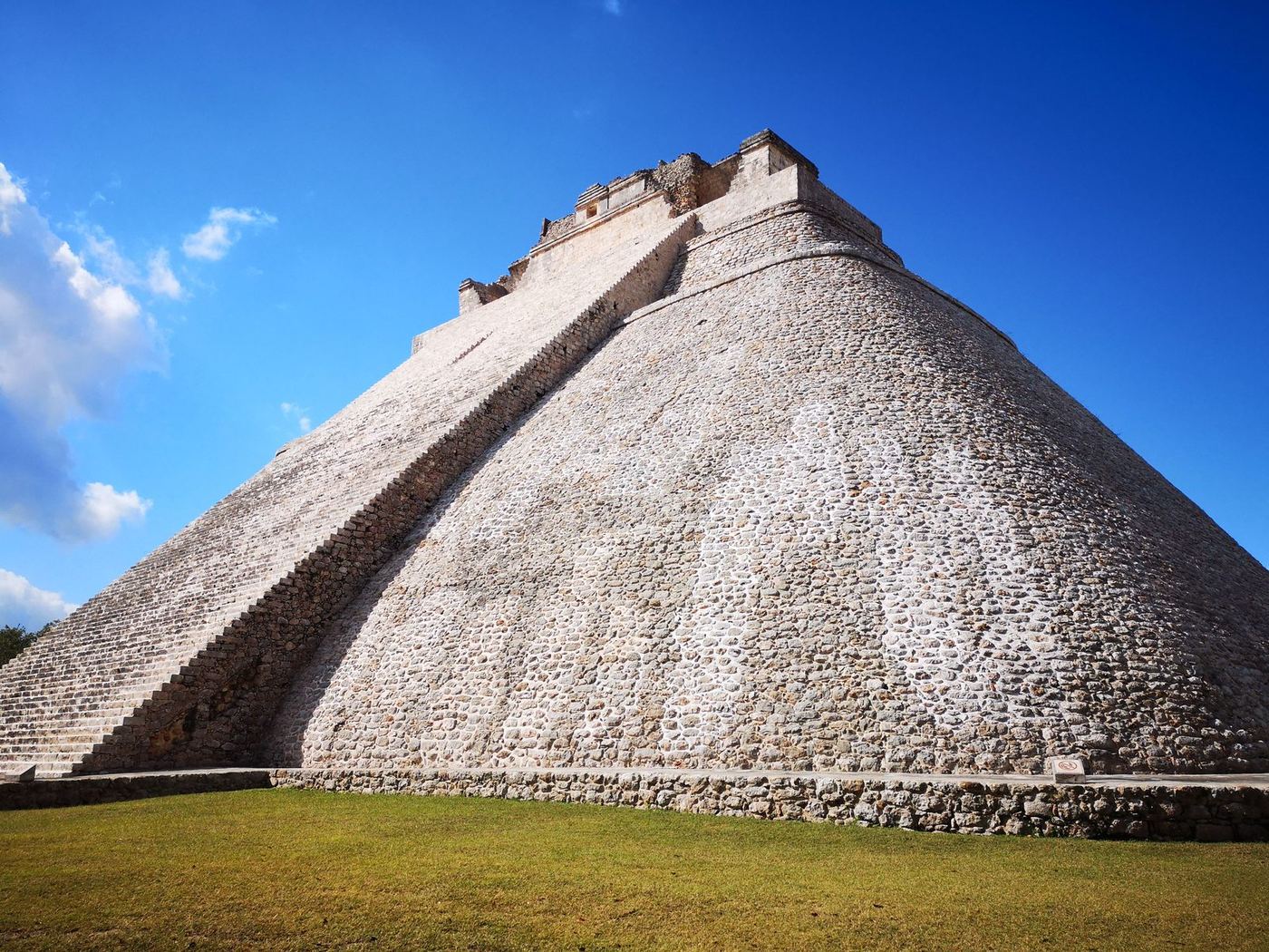 The Pyramid of the Magician at Uxmal, Yucat&aacute;n, under a blue sky