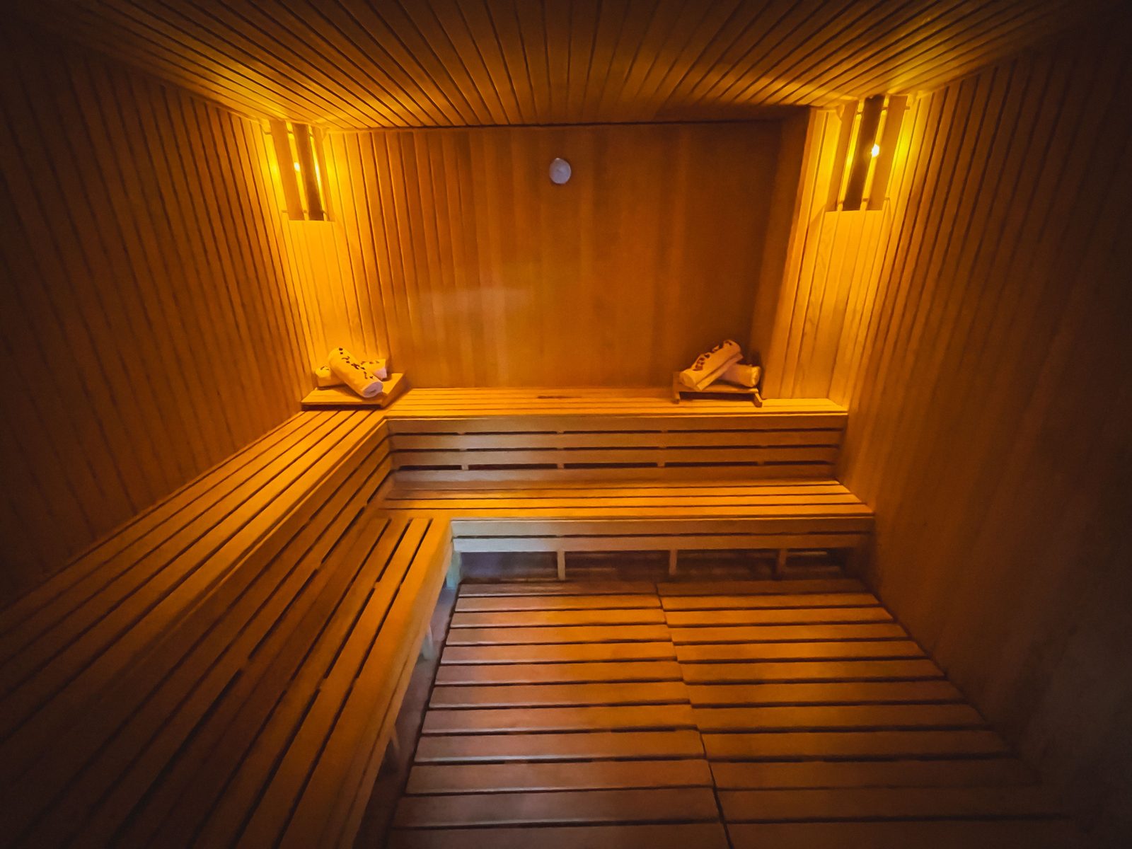 Warm wooden sauna interior for post-work recovery in Tulum